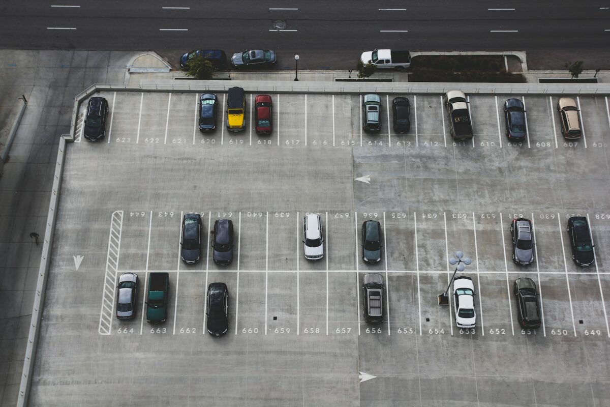 aerial view of cars parked on parking